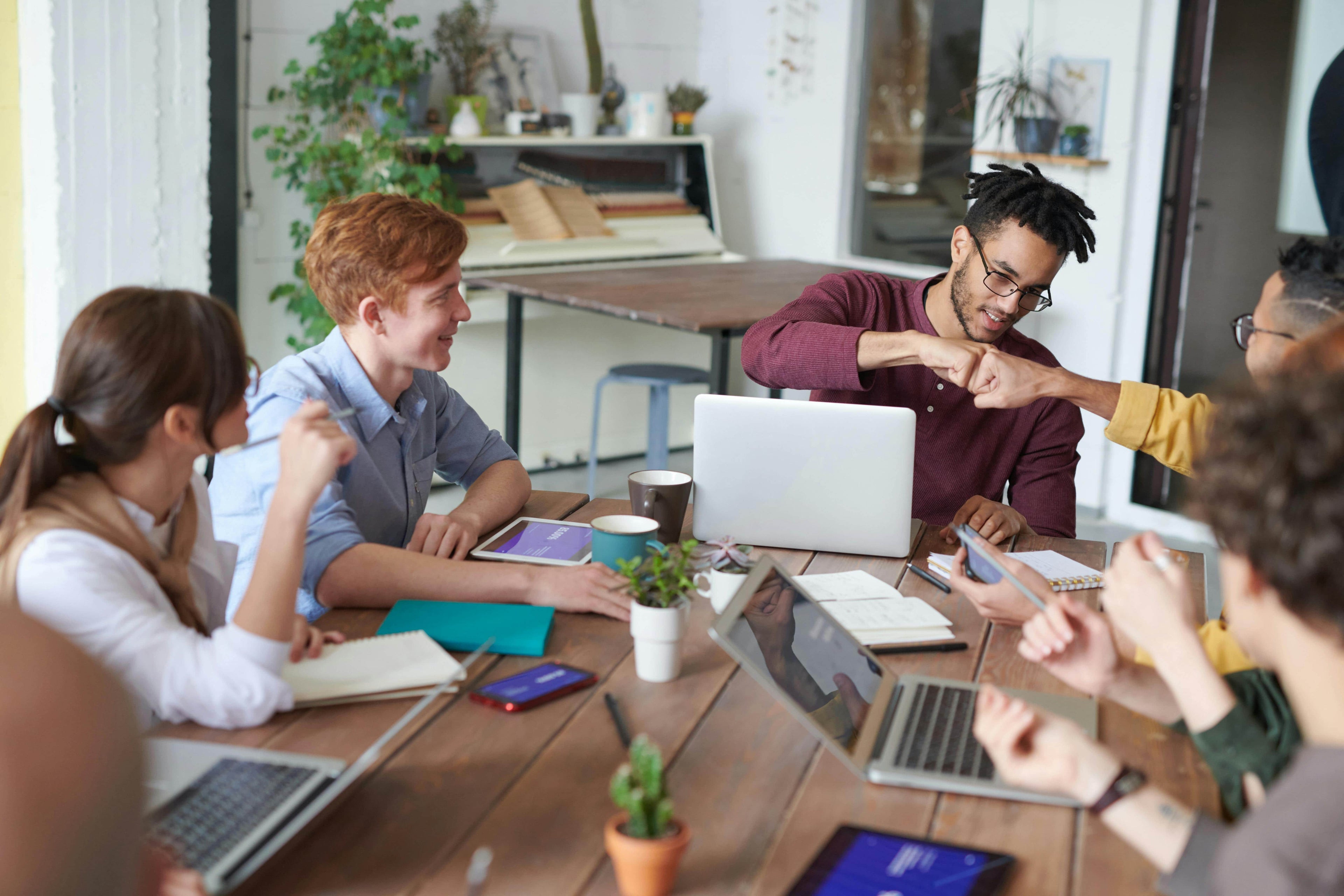 group of colleagues around a conference table